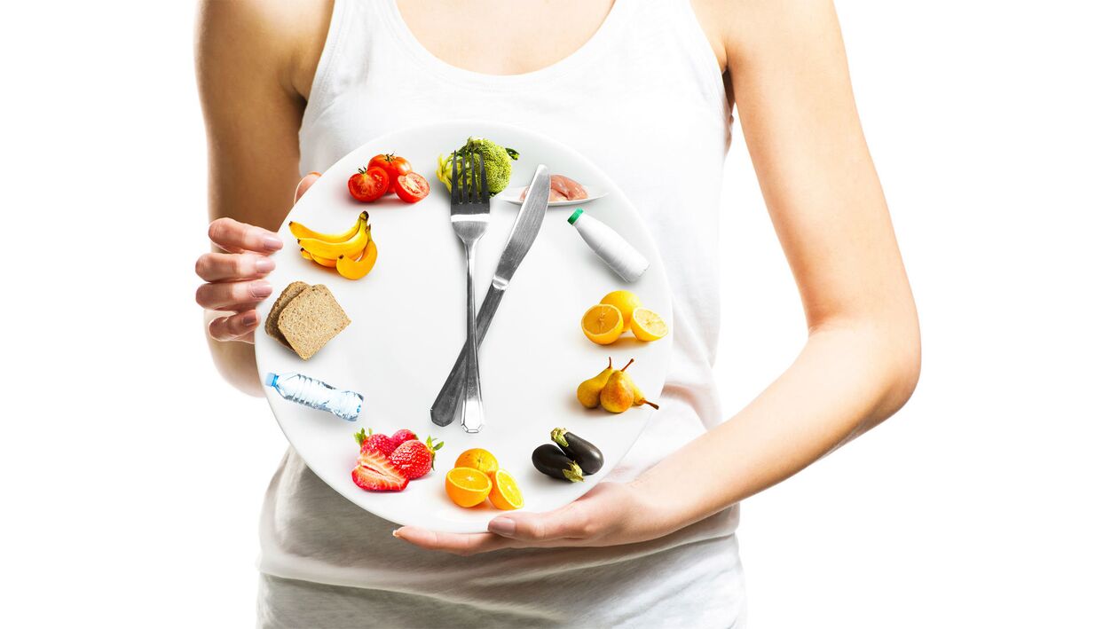 The girl has a plate of food