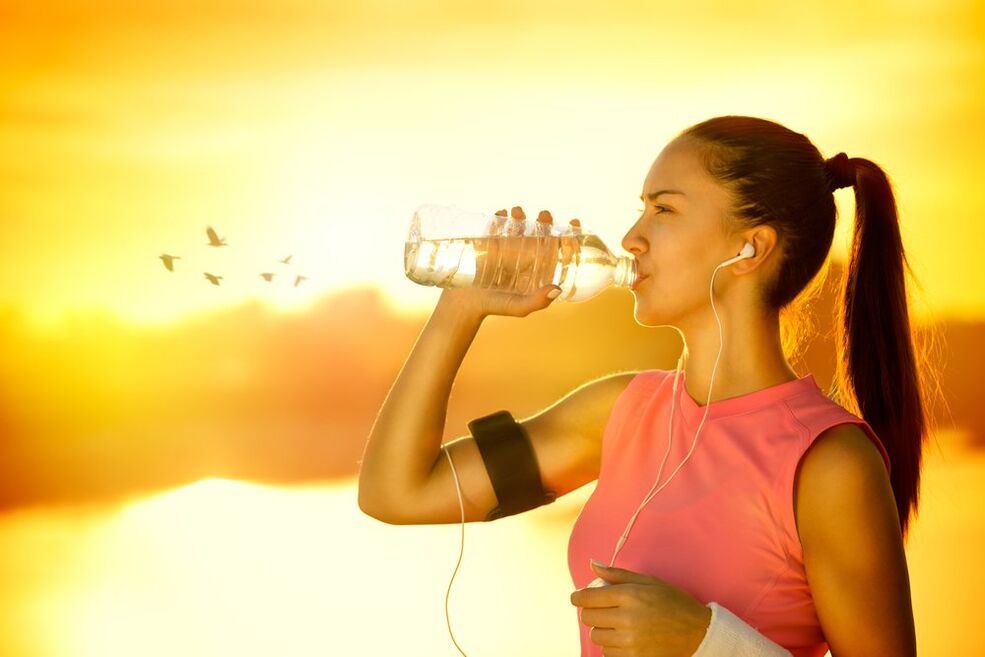 The girl drinks water